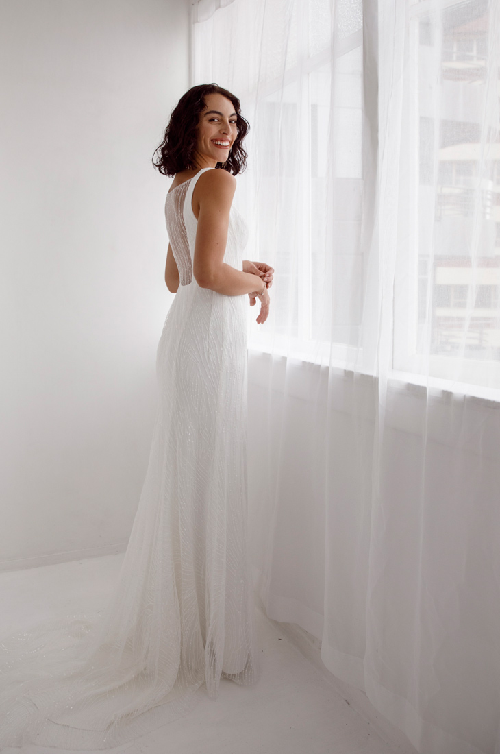 Back view of Katrina, a simple wedding dress.