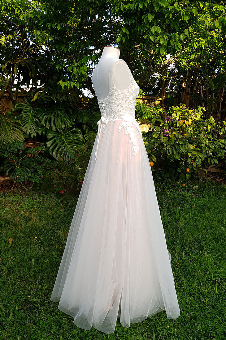 Romantic tulle wedding dress with sheer lace corset.