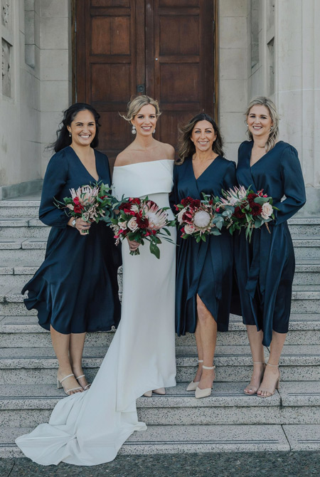 Bride and bridesmaids, wearing Navy.
