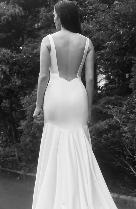 Fitted wedding dress with low back.