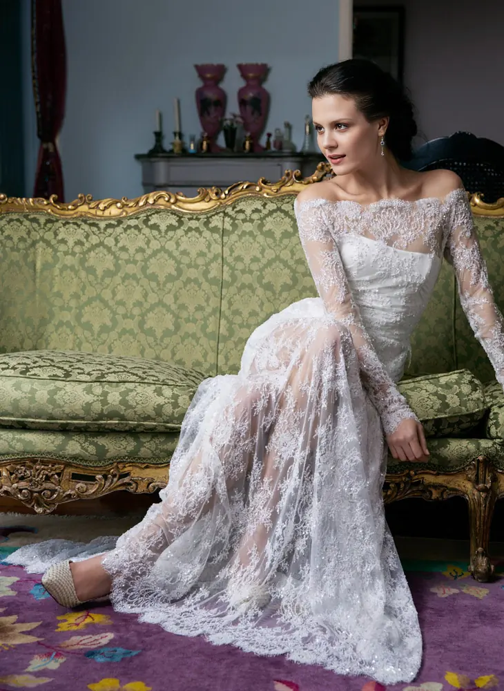 Beaded long sleeve wedding dress with hand-embellished lace and subtle sparkle, crafted in Auckland.