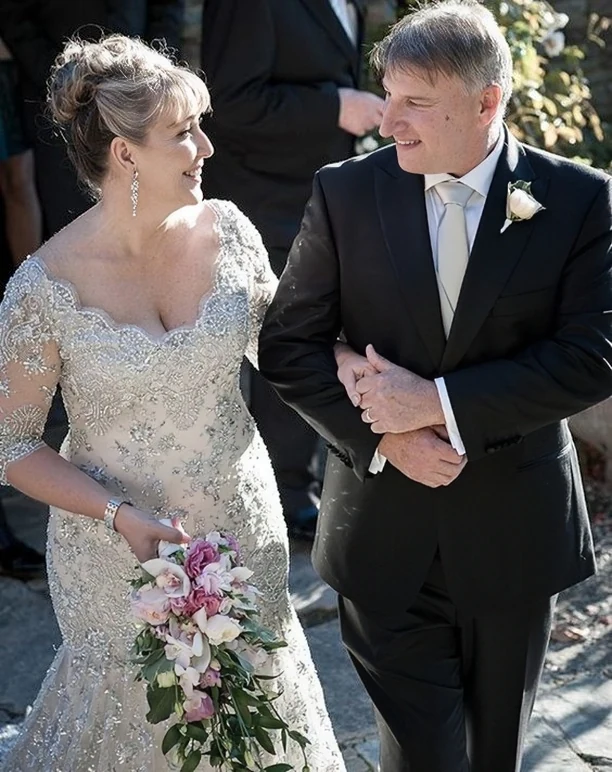 Custom long sleeve wedding dress in beaded French lace, made by Anna Schimmel Bridal in Auckland, NZ.