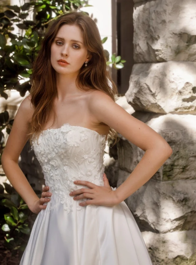 Beautiful in 3D blossoms.

#annaschimmel
#nzbridal
#floralweddingdress
#straplessweddingdress
