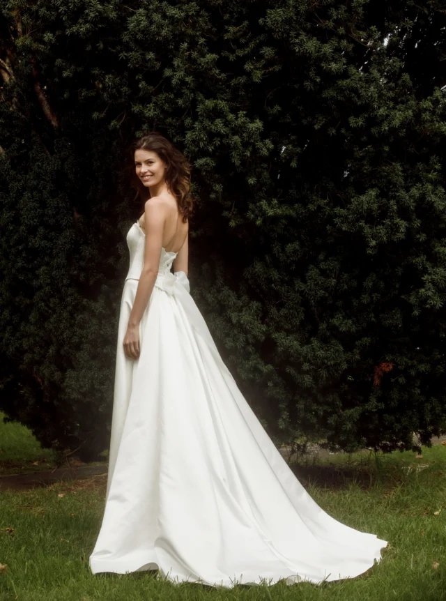 A wedding dress that transforms.

Crafted in glossy satin, this striking two-piece wedding dress features a separate bodice and skirt, finished with a dramatic detachable train.

Wear the full look for a grand entrance, then remove the train for a simpler, more practical silhouette later in the day. And because the bodice is separate, you can even swap the long skirt for a short one when it is time to dance.

One dress, several looks - and a design that can change with the celebration.

#TwoPieceWeddingDress #DetachableTrain #SatinWeddingDress #WeddingDressDesign #NZWeddingDress