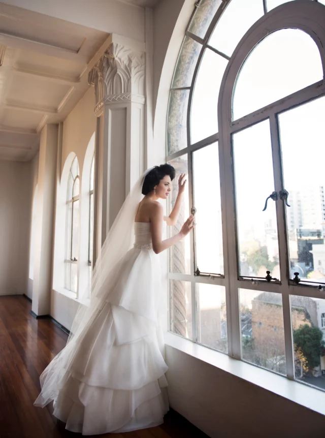 Modern romance in sculptural layers.

A softly draped strapless bodice is defined by a delicate beaded waistband, before flowing into a full skirt of sweeping, asymmetrical tiers.

Elegant, feminine and just a little unexpected, this wedding dress balances clean lines with beautiful movement and volume.

#StraplessWeddingDress #LayeredWeddingDress #ModernWeddingDress #DesignerWeddingDress #NZBride #NZWeddings