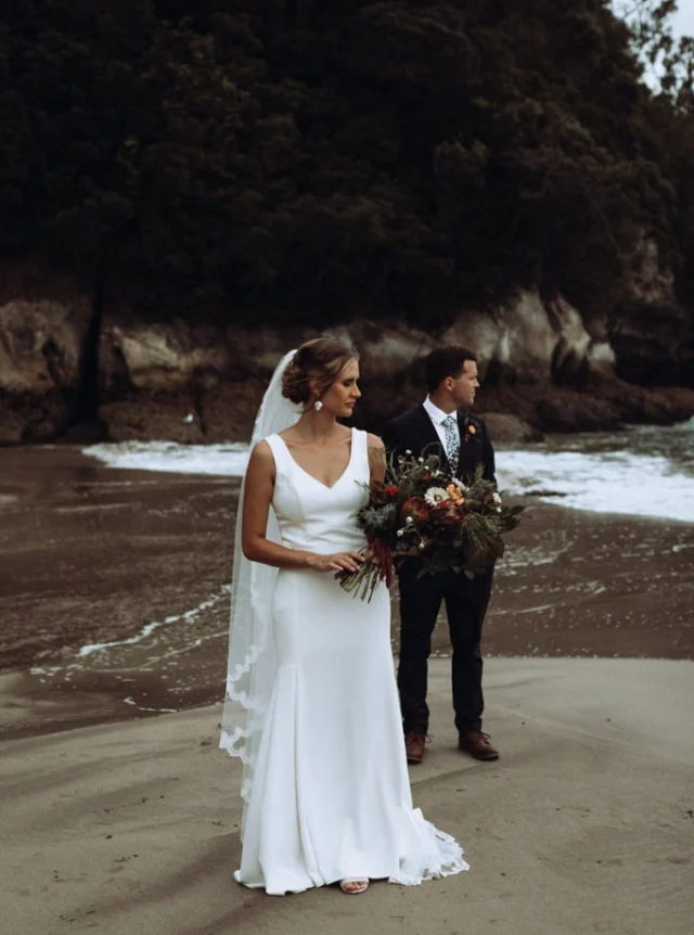 Jessica, wearing an elegant fit and flare French crepe wedding dress with low back.

@twobirds_and_co 
#nzwedding
#nzbride
#realwedding
#nzbridal